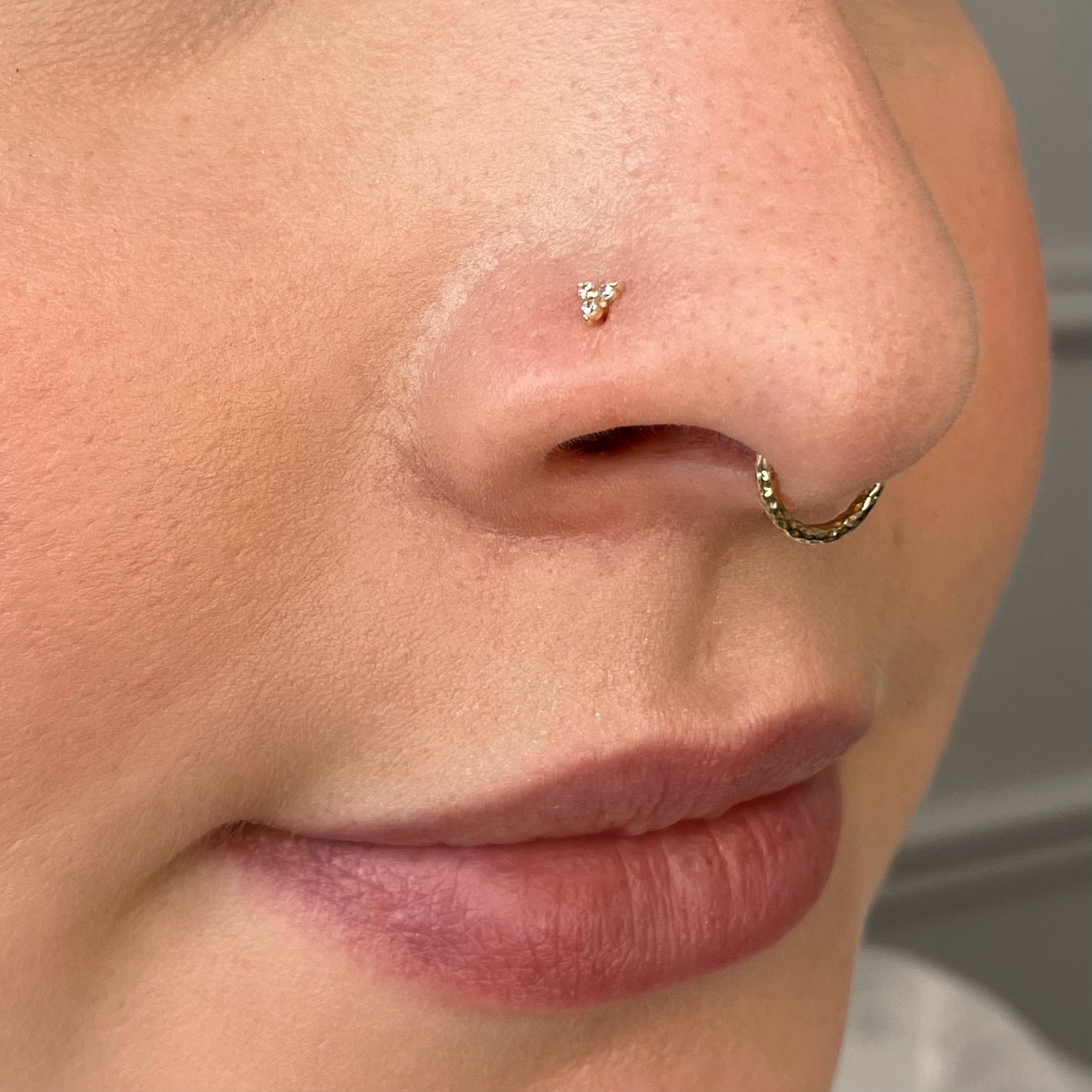 Blue banana store nose piercing